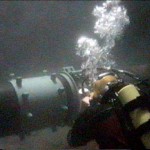 Diver installing coupling