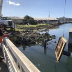 Flying an outfall flat patch into position.