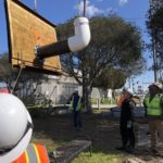 Flying an outfall flat patch into position.