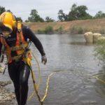 Diver exits the water.